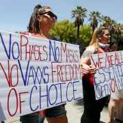 Coronavirus Conspiracy Theories and Reopen Protests as Death Denial